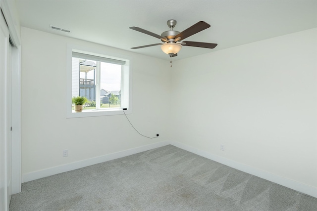 309 NW Beechwood Dr, Grimes, IA 50111 - unfurnished bedroom with light colored carpet, ceiling fan, and a closet