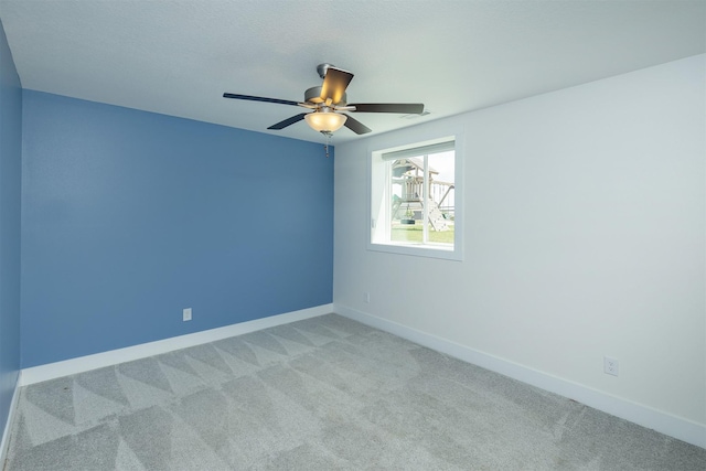 309 NW Beechwood Dr, Grimes, IA 50111 - spare room with ceiling fan and light carpet