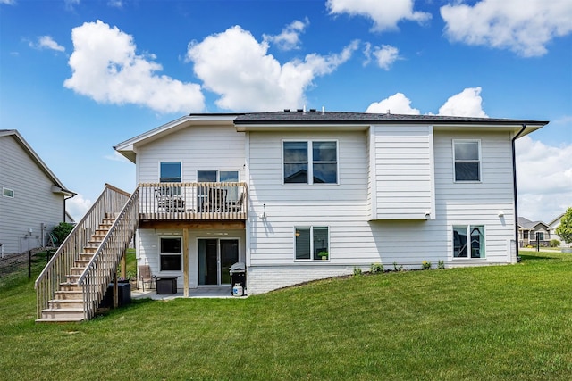 309 NW Beechwood Dr, Grimes, IA 50111 - back of property with a yard, stairway, a patio area, and a wooden deck