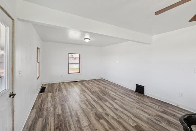 7404 Sioux Ave, Reasnor, IA 50232 - empty room featuring wood finished floors and a ceiling fan