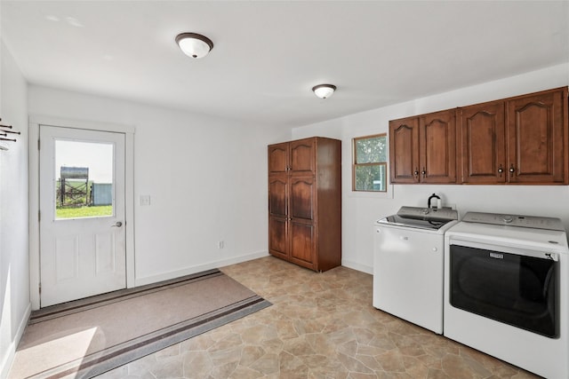 7404 Sioux Ave, Reasnor, IA 50232 - laundry area with washing machine and dryer and cabinet space
