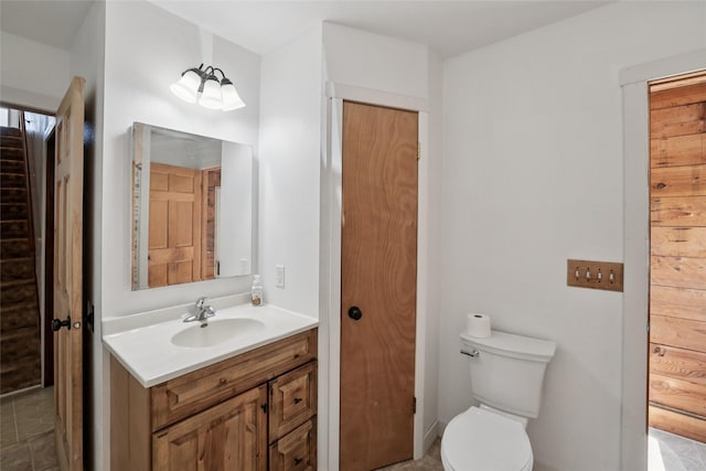 7404 Sioux Ave, Reasnor, IA 50232 - bathroom with vanity and toilet