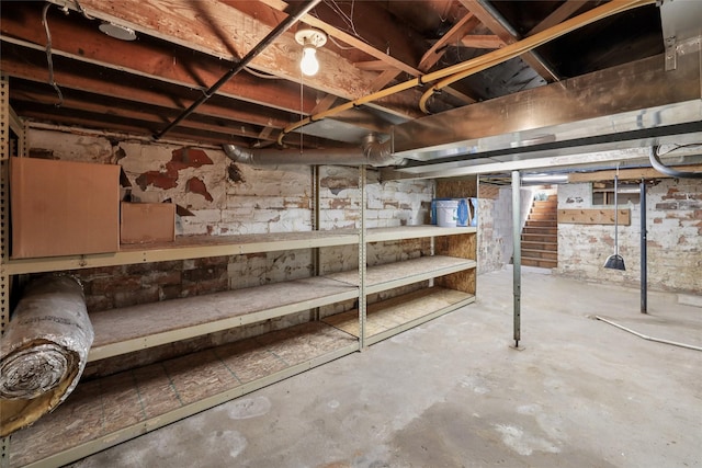7404 Sioux Ave, Reasnor, IA 50232 - unfinished basement featuring stairs