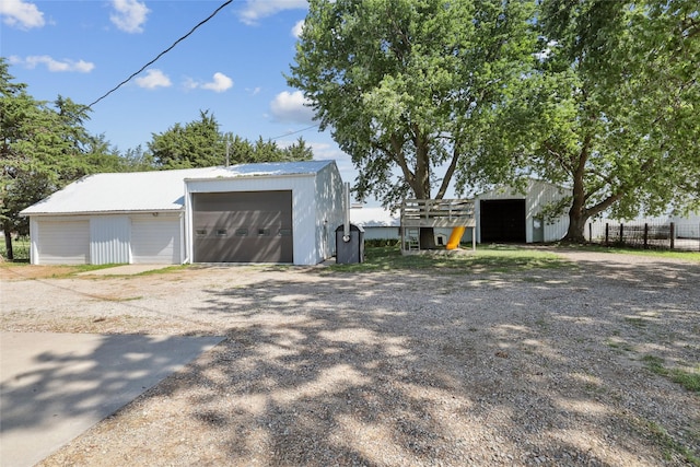 7404 Sioux Ave, Reasnor, IA 50232 - detached garage featuring driveway