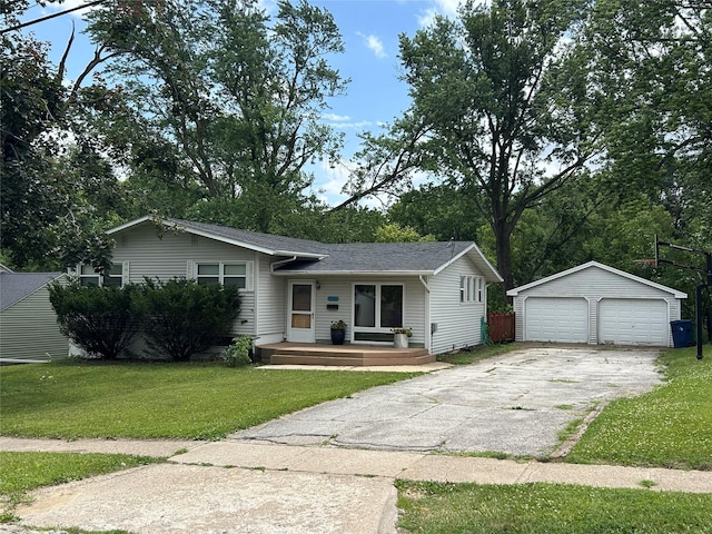 7116 Maple Dr, Urbandale, IA 50322 - view of front of home featuring an outdoor structure, a garage, and a front yard