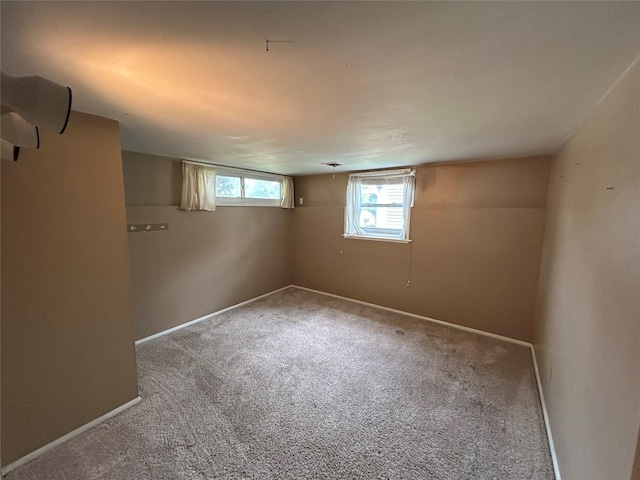 7116 Maple Dr, Urbandale, IA 50322 - below grade area with carpet floors and baseboards