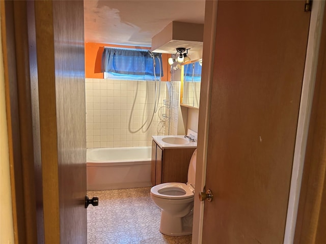 7116 Maple Dr, Urbandale, IA 50322 - bathroom with vanity and shower / washtub combination