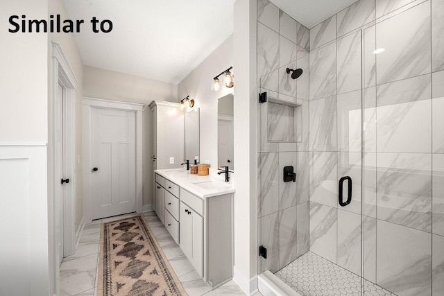 3217 NW Prescott Ct, Grimes, IA 50111 - full bathroom with marble look tiles, double vanity, and a stall shower