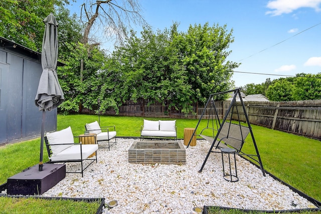 1315 Bundy St, Des Moines, IA 50315 - fenced backyard featuring an outdoor living space and a patio area