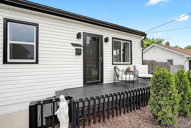 1315 Bundy St, Des Moines, IA 50315 - view of home's exterior with a deck