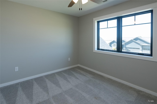 807 W Orchard Ave, Indianola, IA 50125 - carpeted empty room with a ceiling fan and baseboards