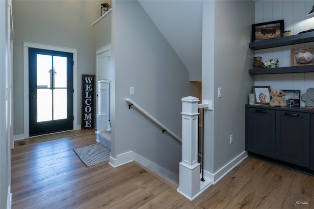 807 W Orchard Ave, Indianola, IA 50125 - entrance foyer with light wood-type flooring and baseboards