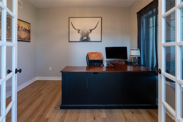 807 W Orchard Ave, Indianola, IA 50125 - office space featuring french doors and wood finished floors