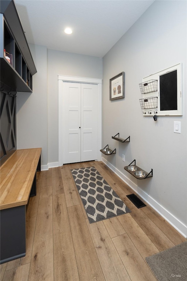 807 W Orchard Ave, Indianola, IA 50125 - mudroom with hardwood / wood-style flooring