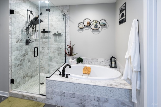 807 W Orchard Ave, Indianola, IA 50125 - bathroom with a bath and a stall shower