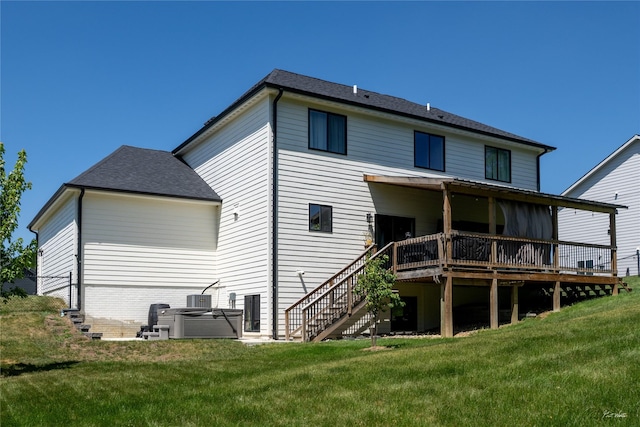 807 W Orchard Ave, Indianola, IA 50125 - rear view of house featuring a wooden deck, stairway, a lawn, and roof with shingles