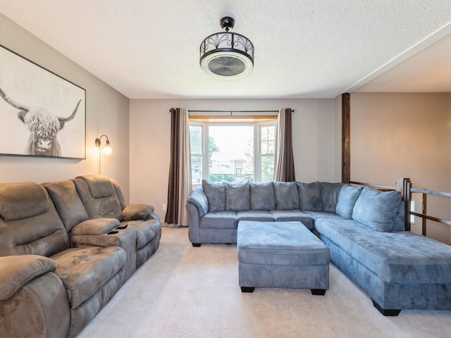 808 SW 2nd St, Stuart, IA 50250 - living room with light colored carpet and a textured ceiling