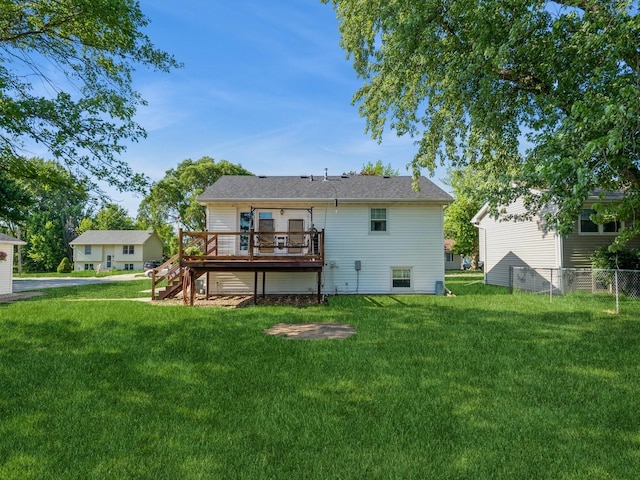 808 SW 2nd St, Stuart, IA 50250 - back of house featuring a deck and stairs