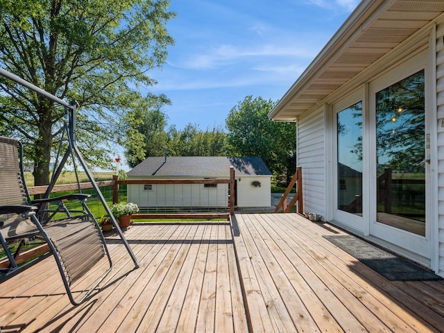 808 SW 2nd St, Stuart, IA 50250 - wooden terrace with an outdoor structure