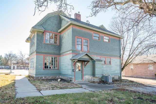 115 W Mclane St, Osceola, IA 50213 - view of front facade with a chimney