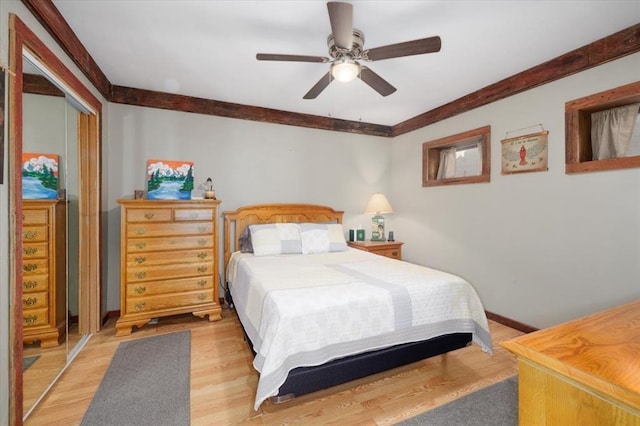 407 E Mckinney St, Runnells, IA 50237 - bedroom featuring light wood-style floors, ceiling fan, and a closet