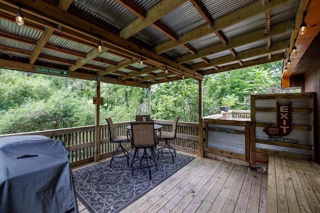 407 E Mckinney St, Runnells, IA 50237 - wooden terrace with a grill and outdoor dining area
