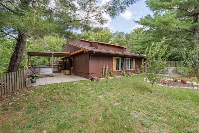 407 E Mckinney St, Runnells, IA 50237 - rear view of property with a patio