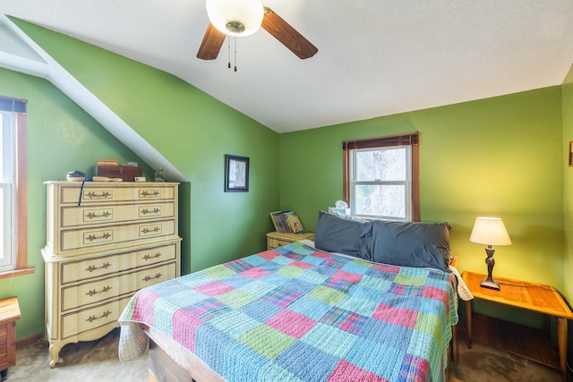 1209 Edgemont St, Des Moines, IA 50315 - carpeted bedroom featuring lofted ceiling and a ceiling fan