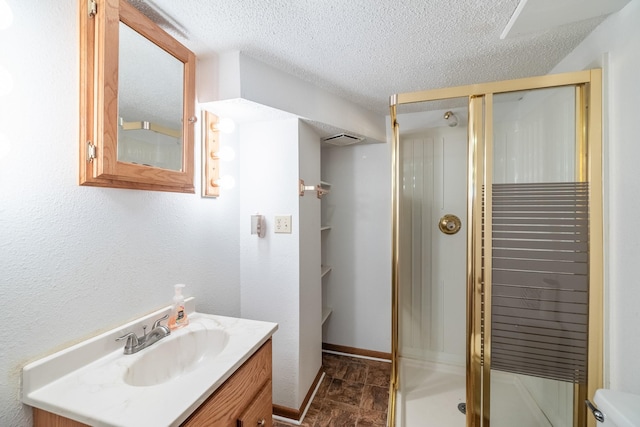 1209 Edgemont St, Des Moines, IA 50315 - full bathroom with vanity, a shower stall, and a textured ceiling