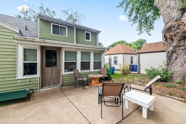 1209 Edgemont St, Des Moines, IA 50315 - view of patio with a fire pit
