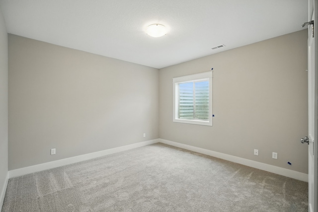 45 NW Alderleaf Dr, Waukee, IA 50263 - empty room featuring carpet and baseboards