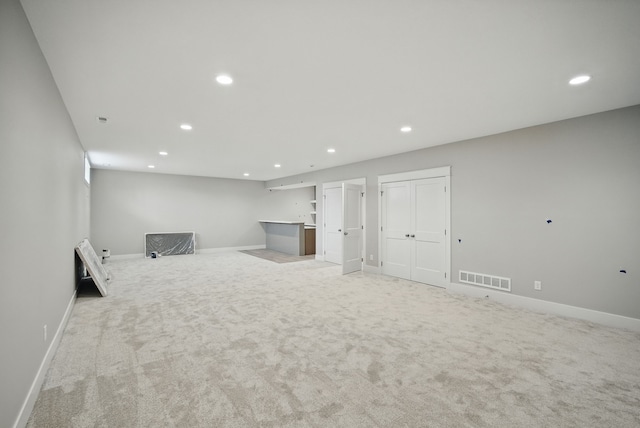45 NW Alderleaf Dr, Waukee, IA 50263 - basement featuring light carpet and recessed lighting