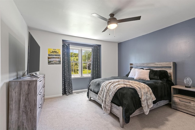 54 Four Winds Dr, Clear Lake, IA 50428 - bedroom featuring light colored carpet and a ceiling fan
