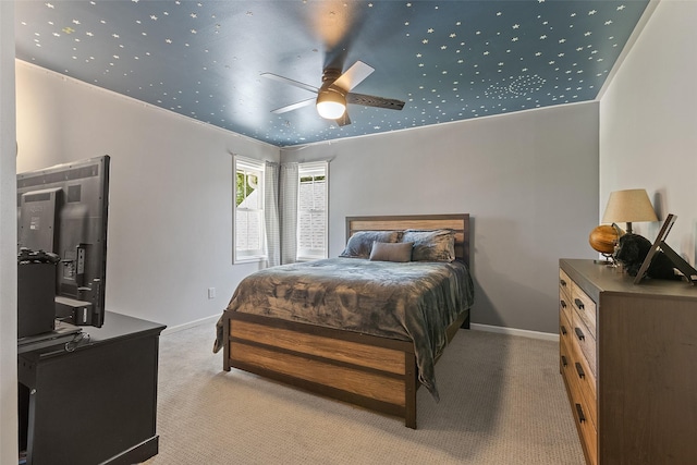 54 Four Winds Dr, Clear Lake, IA 50428 - bedroom featuring light carpet and ceiling fan