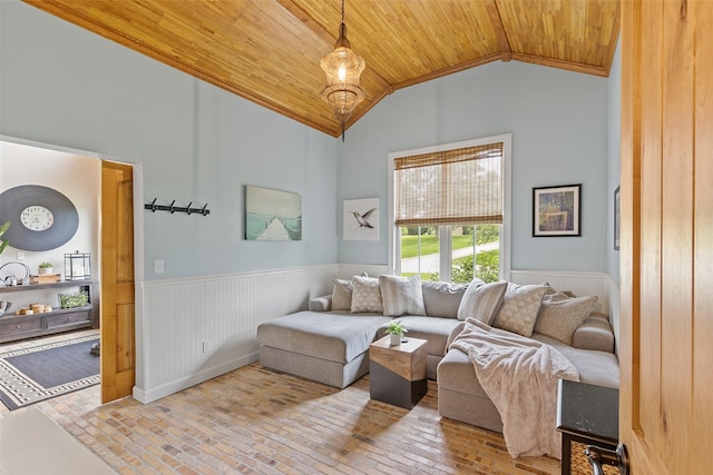54 Four Winds Dr, Clear Lake, IA 50428 - living area with wood ceiling, a wainscoted wall, brick floors, and high vaulted ceiling