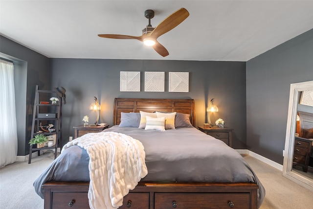 54 Four Winds Dr, Clear Lake, IA 50428 - bedroom with light colored carpet and ceiling fan