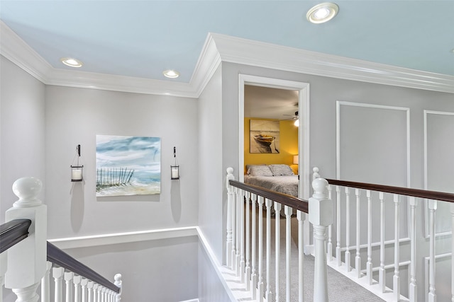 54 Four Winds Dr, Clear Lake, IA 50428 - corridor with an upstairs landing, crown molding, and recessed lighting