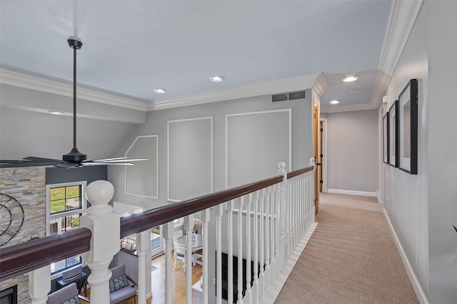 54 Four Winds Dr, Clear Lake, IA 50428 - corridor featuring ornamental molding, recessed lighting, an upstairs landing, carpet, and lofted ceiling