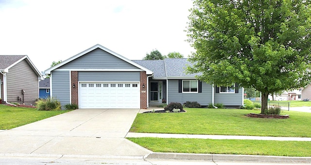 302 Crossing Ct NW, Bondurant, IA 50035 - ranch-style house featuring brick siding, an attached garage, a front lawn, and driveway