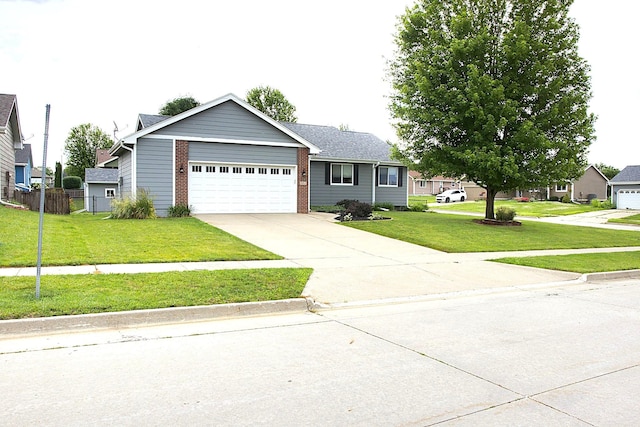 302 Crossing Ct NW, Bondurant, IA 50035 - ranch-style house featuring brick siding, an attached garage, and driveway