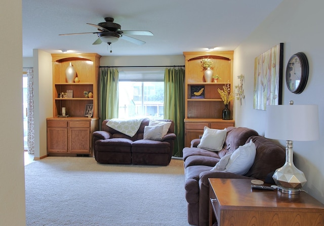 302 Crossing Ct NW, Bondurant, IA 50035 - living room featuring a ceiling fan and light colored carpet