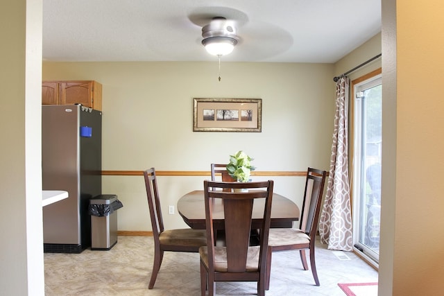 302 Crossing Ct NW, Bondurant, IA 50035 - dining space with ceiling fan and baseboards