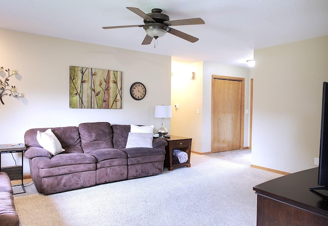 302 Crossing Ct NW, Bondurant, IA 50035 - living area with carpet floors and ceiling fan