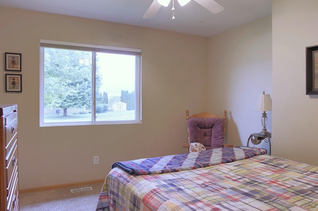 302 Crossing Ct NW, Bondurant, IA 50035 - bedroom with carpet floors and ceiling fan