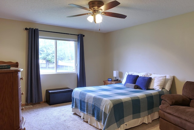 302 Crossing Ct NW, Bondurant, IA 50035 - bedroom featuring light carpet, a ceiling fan, and a textured ceiling