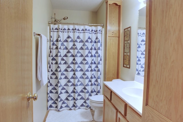 302 Crossing Ct NW, Bondurant, IA 50035 - bathroom featuring vanity and a shower with shower curtain
