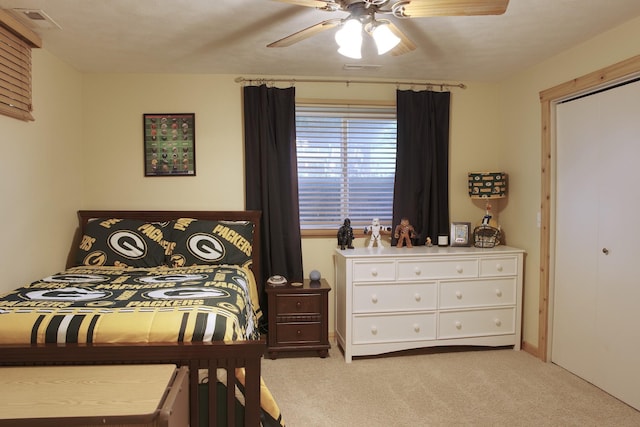 302 Crossing Ct NW, Bondurant, IA 50035 - bedroom featuring carpet floors and a ceiling fan