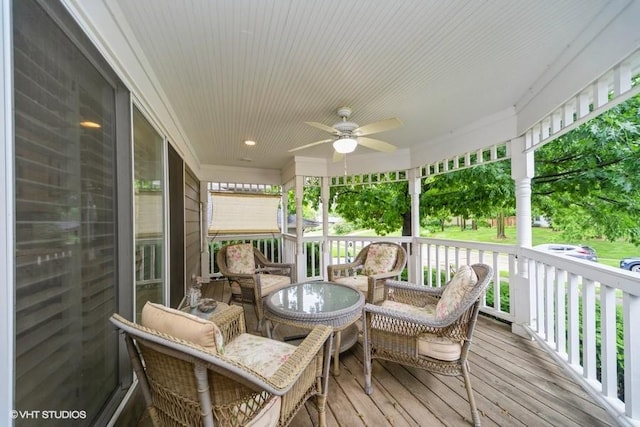 7100 Holcomb Ave, Urbandale, IA 50322 - wooden porch featuring ceiling fan