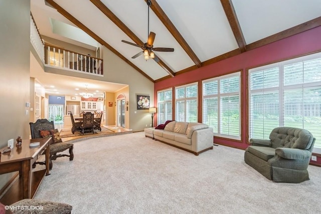7100 Holcomb Ave, Urbandale, IA 50322 - living area featuring high vaulted ceiling, carpet flooring, beamed ceiling, a chandelier, and ceiling fan