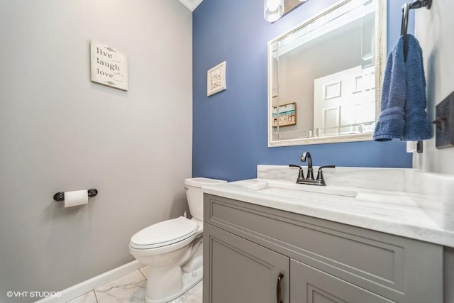 7100 Holcomb Ave, Urbandale, IA 50322 - bathroom with marble look tiles and vanity